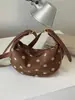 Bolso bandolera de moda estilo coreano, lindo y moderno, nueva colección verano 2026, diseño simple, adecuado para el trabajo y los desplazamientos, bolso de hombro de lunares de moda