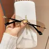 Gafas de Sol Nuevas Sin Marco Tendencia Versátiles Unisex Alta Apariencia Textura Premium Protección Solar Gafas de Sombra