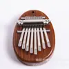 Mini piano de pulgar de 8 tonos de cristal pequeño lindo fácil de llevar mini colgante de celebridad de internet mini instrumento musical al por mayor