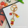 Llavero Colgante Año Nuevo 2026 Metal Zodiaco León Dorado Petardo Despertar Bolsa de la Fortuna Colgante Evento Pequeño Regalo