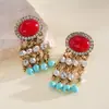 Pendientes de Borla con Piedra Ovalada de Resina Incrustada de Diamantes Transfronterizos Europeos y Americanos Estilo Étnico Lujo Ligero Pendientes de Alta Gama para Mujer