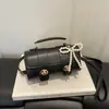 Versátil Bolso Nuevo para Mujer 2026 Nueva Moda Estilo Retro Bolso de Mano Cuadrado Pequeño con Acabado de Alta Gama, Bolso de Hombro y Cruzado