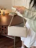 Bolso de Axila de Estilo Francés Transfronterizo de Nicho para Mujer Nuevo Modelo 2026 Bolso Tote Simple y Elegante Bolso Cruzado de Alto Valor