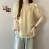 Coleção de verão 2026 nova para mulheres plus size: camisa de chiffon de manga curta com um laço grande, apresentando uma barra franzida e um design estilo boneca