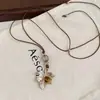 Cordón de Cuero Retro Ojo de Tigre Cerámico Colgante de Gota de Agua Collar de Tipo Tirador Sentido del Diseño Cadena para Suéter Collar Versátil
