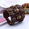 Popular Europeu e Americano Mais Vendido Largo Couro Estilo Punk Pulseira de Couro de Vaca Cabeça de Caveira de Liga Metálica Criativa Pulseira Versátil para Homens e Mulheres