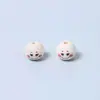 Cara sonriente cuentas de madera de loto color madera natural cuentas sueltas de madera expresión accesorios para joyería DIY cuentas de madera al por mayor transfronterizo Amazon