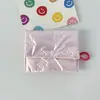 Bolsa de Monedas Plegable con Lazo de Corazón de PU Brillante Portátil Tarjetero Rellena de Algodón Acolchada Bolsa de Mano para Toallas Sanitarias