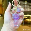 Figura de oso de cristal acrílico transparente de colores, una elegante pieza de decoración para el hogar, adorno de escritorio y accesorio para llavero