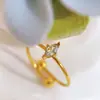 Anel de Trevo de Quatro Folhas da Sorte Feminino Luxo Leve Design de Nicho Personalidade Abertura Ajustável Diamantes Brilhantes Exquisito Fashionável Retro Anel de Dedo Atacado