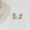 Aretes de Tuerca Geométricos de Estrella de Acero Titanio con Bolas de Acero Grandes y Pequeñas de Moda Simple al por Mayor de Fábrica de Venta Caliente Aretes Perforados Mujeres