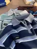 Suéter de punto con cuello polo y media cremallera a rayas retro japonés para hombre y mujer, estilo perezoso holgado de invierno, top de diseño de nicho
