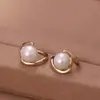 Hebilla de oreja de cuentas de oro champán simple, diseño de nicho, pendientes de alta gama, temperamento de moda, pendientes de perlas vintage