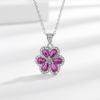 Nuevo en vivo Transfronterizo Incrustado Rubí Rojo Gotas de Agua Clásico Brillante Sensación de Alta Gama Aretes Anillo Collar traje de Diamantes Completos