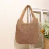 Bolso de hombro tejido para mujer, nuevo bolso tote de paja calado primavera/verano, bolsa de playa de gran capacidad para vacaciones, bolso de ganchillo hecho a mano