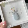 Colgante de Piedra Ojo de Gato con Cierre de Paz para Mujer, Collar de Calcedonia con Cierre Ruyi Multicolor, Nuevos Accesorios de Estilo Chino Nacional, Suministro Mayorista para Transmisión en Vivo