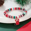 Set de pulseras de arcilla blanda navideñas transfronterizas europeas y americanas, pulsera navideña con colgante de aleación de campana de Papá Noel al por mayor