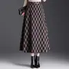 Saia Midi de Lã Xadrez Feminina 2026 Outono/Inverno Novo Estilo Cintura Elástica Saia Longa Elegante Versátil Barra Larga