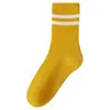 Calcetines de otoño e invierno para mujer Zhuji, de media pantorrilla, cálidos, nuevos, de moda, para influencer deportiva, calcetines negros de tubo largo holgados