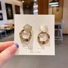 Pendientes de metal de alta calidad con incrustaciones de diamantes de estilo coreano para mujer, elegantes y populares, con la misma forma geométrica redonda que adelgaza el rostro.