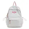 Mochila escolar fresca y sencilla para niñas, versión coreana, adecuada para estudiantes de primaria de tercero a sexto grado, mochila versátil de color liso de gran capacidad para estudiantes de secundaria