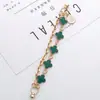 Pulsera de Trébol de Cuatro Hojas de Aleación de Zinc Nueva Zhuzi Jewelry Accesorios de Joyería DIY Cadena de Aceite Goteo Hecha a Mano Decoración para Funda de Teléfono Móvil