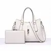 Bolso de mano de bajo perfil de alta gama para madre e hija, tendencia europea y americana 2026, para ir al trabajo y viajar, bolso bandolera versátil, suministro del fabricante