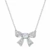 Collar de moissanita chapado en oro blanco para mujer, simple y elegante, colgante clásico de trébol de cuatro hojas, joyería de cadena para la clavícula, artículo popular de transmisión en vivo