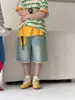 Pantalones infantiles Moxiaomeng 2026 verano para niños y niñas estilo coreano casual jeans pantalones versátiles de longitud media para niños