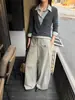 Han Xun, roupa de trabalho inteligente e estilosa: patchwork listrado, gola de camisa falsa de duas peças, top emagrecedor para mulheres, coleção outono/inverno 2026, estilo 27611