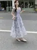 Vestido Novo Retro Outono 2026 Gola Quadrada Estampa Floral Feminino Super Fada Estilo Floresta Cintura Marcada Emagrecedor Barra com Babados Saia Longa