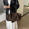 Bolso tote de axila con estampado de leopardo y pliegues retro para mujer, nueva colección otoño 2026, bolso de mano de moda niche, bolso de hombro para el día a día