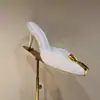 Sandálias de Salto Ultra Alto com Tiras Finas Abertas nas Costas e Biqueira Metálica Decorada - Nova Coleção Primavera/Verão 2025 Desfile de Moda de Paris