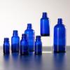 Botella de aceite esencial azul esmerilado de 15 ml, botella de vidrio subenvasada para cosméticos, botella con gotero y cabezal de pegamento para esencia
