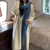 Cárdigan de punto suelto suave y ceroso de estilo perezoso de longitud media abrigo con sentido de diseño para mujer primavera otoño