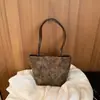 Bolso de Mano Estampado de Leopardo para Mujer Gran Capacidad 2026 Nuevo Otoño Invierno Nicho Vintage Bolso de Hombro Único Bolso Cubo para el Trabajo y el Trayecto