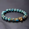 Pulseira de Cristal Curativo com Pedra Olho de Tigre e Contas de Malaquita, Design Unissex com Formas de Leão e Leopardo