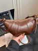 Bolso croissant vintage de nicho 2026 verano nuevo estilo ins para el trabajo bolso de hombro para teléfono bolso cruzado bolso de albóndiga moderno