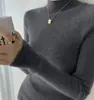 Suéter de tricô de design retrô de alta qualidade para mulheres, nova coleção outono/inverno, chique casual estilo francês, versátil e elegante, top de nicho e versátil