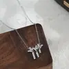 Cadena para clavícula elegante de oro auténtico chapado con circonita microincrustada para mujer, diseño único con collar de lazo y borla, gargantilla exquisita