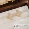 Pendientes de trébol de cuatro hojas Nala para mujer, pendientes de lujo ligero con incrustaciones de diamantes, pendientes de diseño de nicho de alta gama, pendientes de moda para el día a día