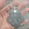 Llavero de Cuero con Forma de Pata de Gato para Guardar Pelo de Mascota en Stock, Colgante Exquisito de Bolsa para Guardar Pelo para Gatitos y Perros