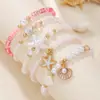 Pulseras Europeas y Americanas Apiladas con Conchas y Estrellas de Mar de Alta Gama Estilo Resort Costero Joyería de Mano de Nicho Collares Versátiles para Mujeres