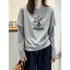Camiseta Manga Longa Patchwork Listrada Falsa Duas Peças Feminina Outono 2026 Solta Modeladora Senso de Design Camiseta Básica Cartoon