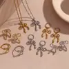 Colar de Personalidade Criativa Transfronteiriço Europeu e Americano Aço Inoxidável Banhado a Ouro 18K Pingente Doce de Laço com Strass Brincos Anel