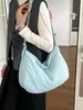Bolsa de mão da moda e versátil em formato de bolinho para mulheres, nova coleção 2026, bolsa de ombro cruzado, bolsa de axila simples e estilosa, adequada para vendas transfronteiriças