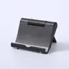 Suporte de celular para mesa com ângulo ajustável dobrável atividade publicidade presente suporte para pessoa preguiçosa presente pode ser feito LOGOTIPO
