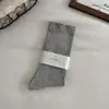 Calcetines de mujer sin costuras para primavera y otoño, calcetines blancos postparto de caña suelta, calcetines holgados de color liso estilo japonés, calcetines largos minimalistas