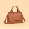 Nova bolsa de mão feminina retrô de couro macio 2026, grande capacidade, adequada para o dia a dia, pode ser usada como bolsa de ombro ou bolsa transversal, design versátil com padrão de lichia
