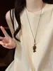Nuevo collar colgante de pez de palisandro estilo chino, estilo étnico vintage, cadena larga versátil para suéter, accesorio de diseñador para mujer